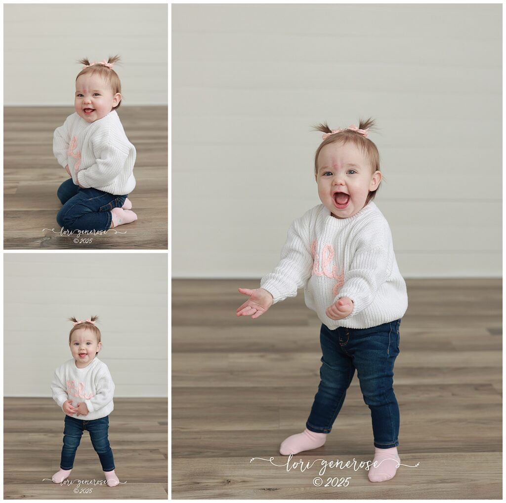 One year old girl in white name sweater and jeans for first birthday one year old portrait photos