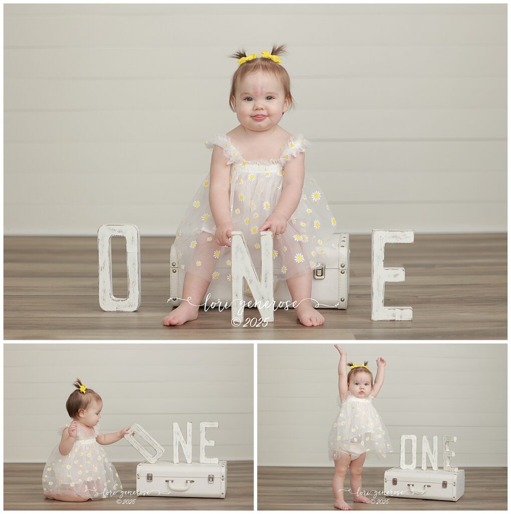 One year old girl in white daisies dress for first birthday one year old portrait photos with letters O-N-E