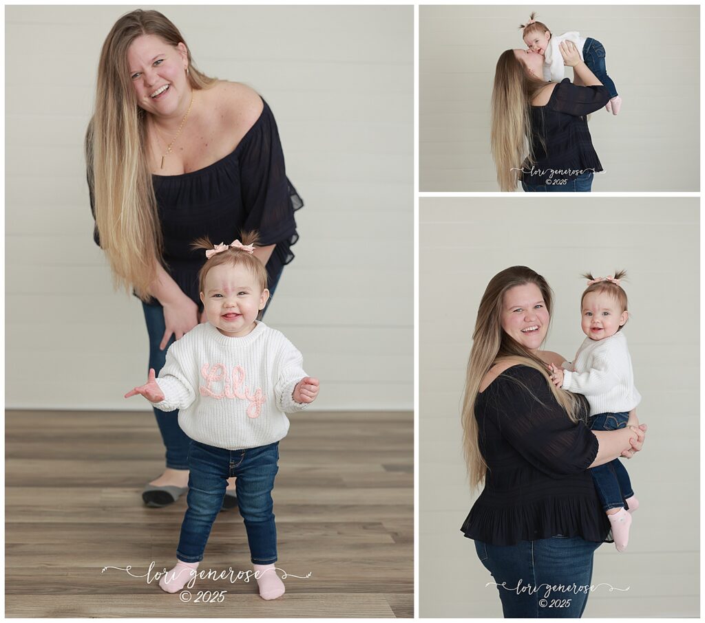 One year old girl in white name sweater and jeans for first birthday one year old portrait photos with her mom kissing her and holding her