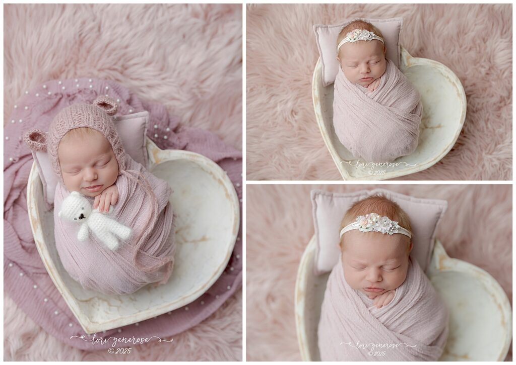 Beautiful newborn baby girl photographed by Lehigh Valley newborn photographer Lori Generose in Lehigh Valley, PA – posed in a cream wooden heart bowl  wrapped in a pink wrap and pink bear hat holding a white knitted mini teddy bear and some of her with a delicate floral headband with her in the heart bowl and her head resting on a mini pink pillow during a professional studio newborn session.